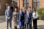 Trudy Harrison MP with staff and pupils from St Bees School