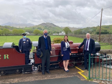 Trudy Harrison MP and VisitBritain Chairman Lord Patrick McLoughlin with Peter Hensman at the Laal Ratty Railway in Eskdale.jpeg
